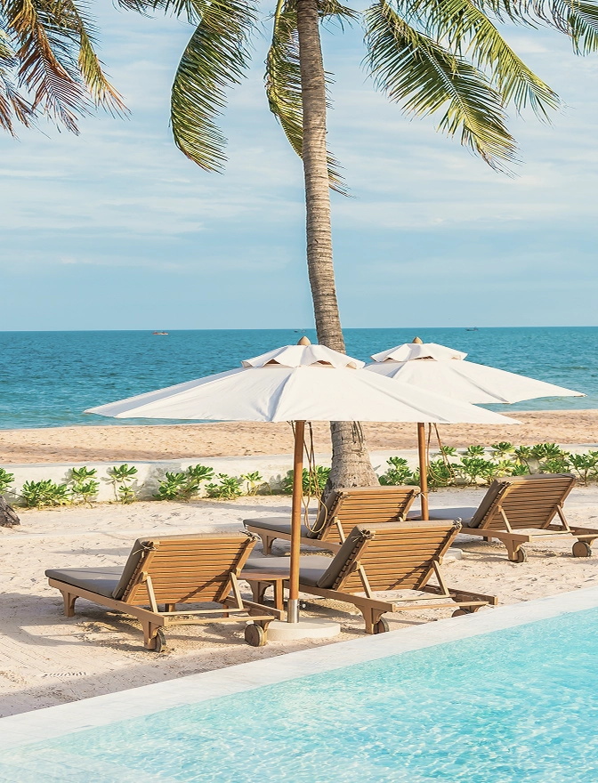 Sun loungers and parasols at the Mira Ocean Estates beach club